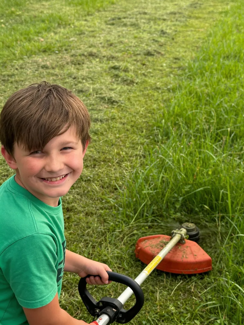Beau with the string trimmer